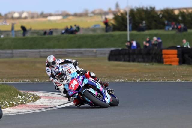 Alastair Seeley leads Jason Lynn (JMcC Roofing) in Superbike Pro. Picture: J Henry