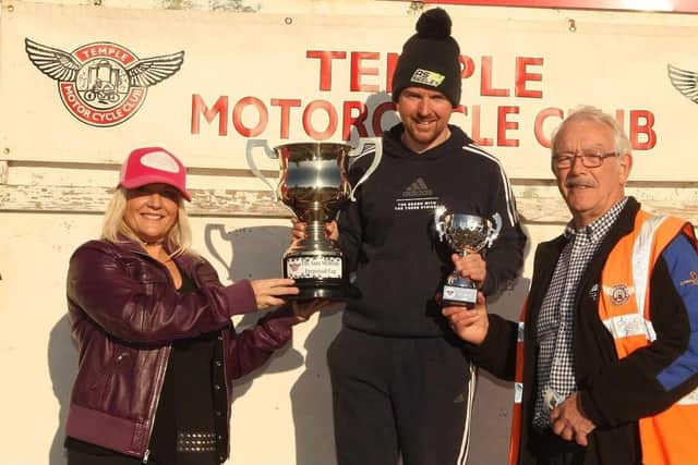 The Sam McBride Superbike Cup and £100 prize money presented to Alastair Seeley by Sharron McBride and Temple Motorcycle Club chairman David Gibson. Picture: R Adams