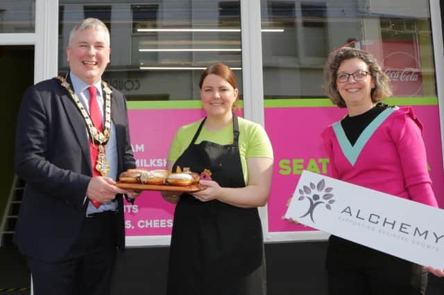 The Mayor of Causeway Coast and Glens Borough Council Councillor Richard Holmes pictured at Three Queens, Coleraine’s new doughnut and dessert bar located on Railway Road, with owner Kirsty Nicholl and Causeway Coast and Glens Borough Council’s Economic Development Officer Louise Pollock
