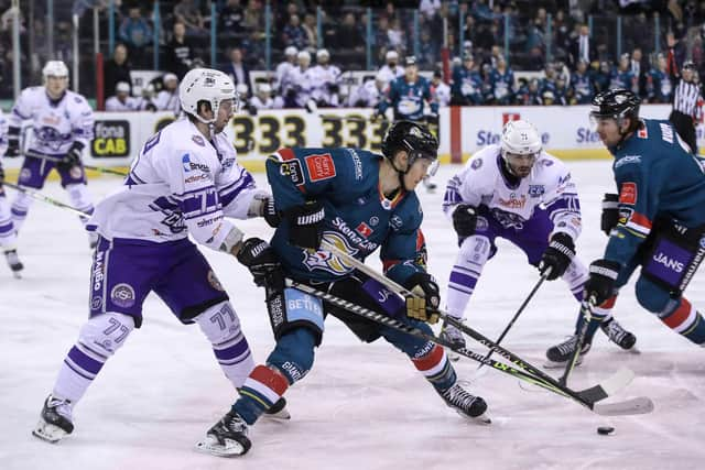 Belfast Giants’ Tyler Soy with Glasgow Clan’s Tim Shoup