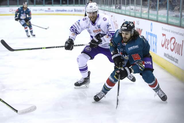 Belfast Giants’ Jordan Boucher with Glasgow Clan’s Brock Beukeboom during last Friday’s Elite Ice Hockey League game