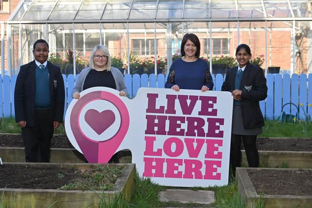 Pictured, from left, pupil Ahmed Hussein and teacher Ciara McKee, St Joseph's College with Live Here Love Here manager Helen Tomb and pupil Bhagya Rajesh, St Joseph's College.