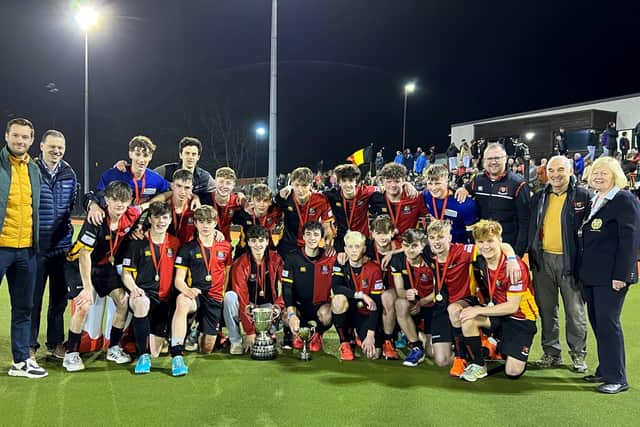 Team coach and manager with the Burney Cup at at the Playball Arena, Stormont, left to right, Mr Simon Jess (1st XI and U15 coach) and Mr Colin Walker (team manager)