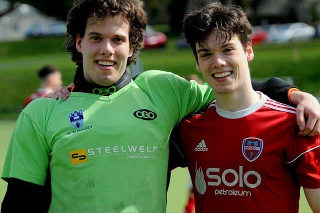 Goalkeeper Josh McCabe pictured with his brother Scott after his man of the match performance against Clontarf.  Picture: Alan Donnelly.