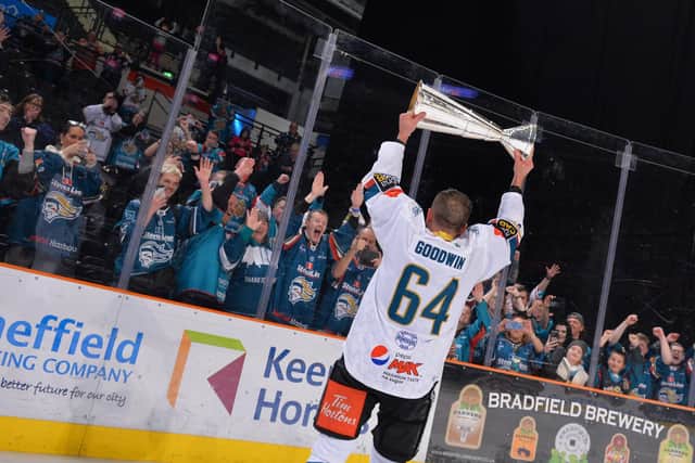 Belfast Giants' captain David Goodwin presents the the Elite League to the travelling Belfast fans at the end of a dramatic weekend in Sheffield which saw the Giants clinch the Elite League championship after defeating the Steelers in a shootout in on Sunday. Picture: Dean Woolley.