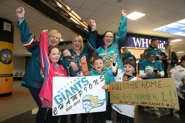 Fans await the Belfast Giants arrival at Belfast International Airport today after being crowned Premier Sports Elite League champions after defeating Sheffield Steelers yesterday. Pictured with the Elite League Trophy are   Photo by William Cherry/Presseye