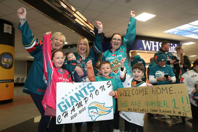 Fans await the Belfast Giants arrival at Belfast International Airport today after being crowned Premier Sports Elite League champions after defeating Sheffield Steelers yesterday. Pictured with the Elite League Trophy are   Photo by William Cherry/Presseye