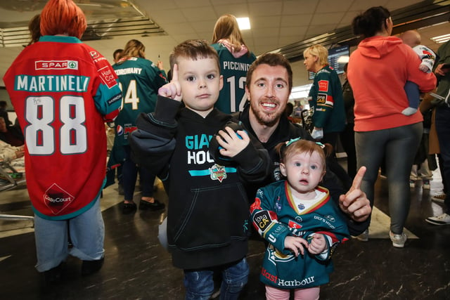 Belfast Giants' Scott Conway with fans as they arrive at Belfast International Airport today after being crowned Premier Sports Elite League champions after defeating Sheffield Steelers yesterday.    Photo by William Cherry/Presseye