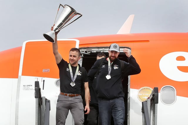 The Belfast Giants' captain David Goodwin and Tyler Beskorowany with the League Trophy as they arrive at Belfast International Airport today after being crowned Premier Sports Elite League champions after defeating Sheffield Steelers yesterday. Pictured with the Elite League Trophy are   Photo by William Cherry/Presseye