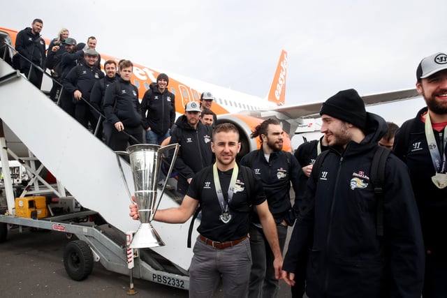 The Belfast Giants captain David Goodwin and teammates  with the League Trophy as they arrive at Belfast International Airport today after being crowned Premier Sports Elite League champions after defeating Sheffield Steelers yesterday. Pictured with the Elite League Trophy are   Photo by William Cherry/Presseye