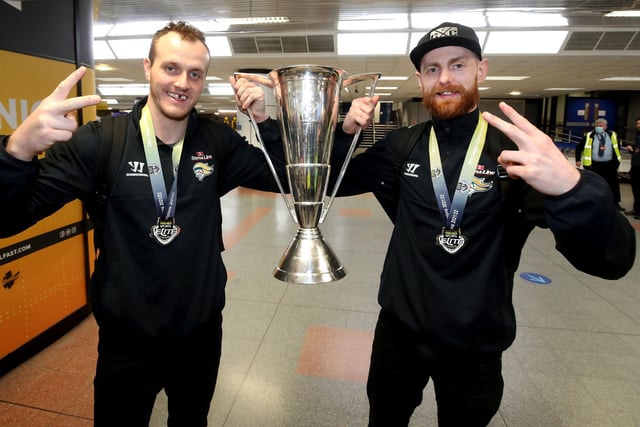 Belfast Giants Mark Cooper and Ciaran Long are met by fans as they arrive at Belfast International Airport today after being crowned Premier Sports Elite League champions after defeating Sheffield Steelers yesterday.    Photo by William Cherry/Presseye