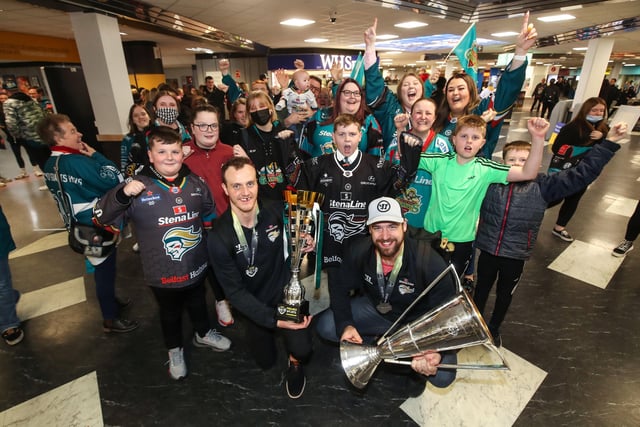 Belfast Giants Mark Cooper and Tyler Beskorowany are met by fans as they arrive at Belfast International Airport today after being crowned Premier Sports Elite League champions after defeating Sheffield Steelers yesterday.    Photo by William Cherry/Presseye