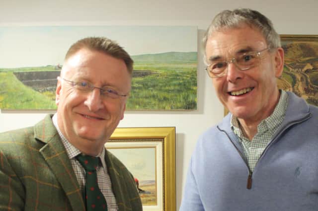 Mark Henderson presenting Gerard McCaughan with his award
