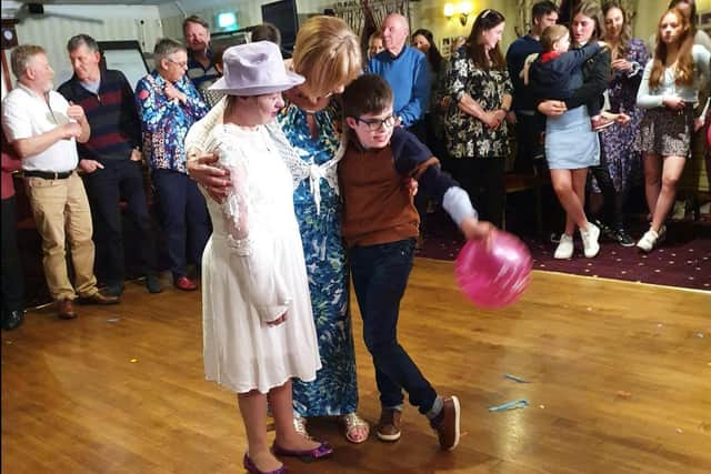 On the dance floor at the birthday party.