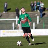 The semi-final has been delayed due to the ongoing eligibility issue surrounding Glentoran's Joe Crowe