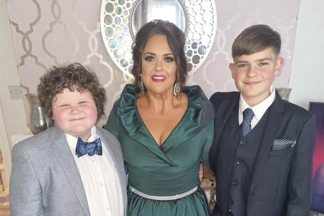 £110,000 Cash Call winner Sinéad Watson with sons Micheál and Bo.