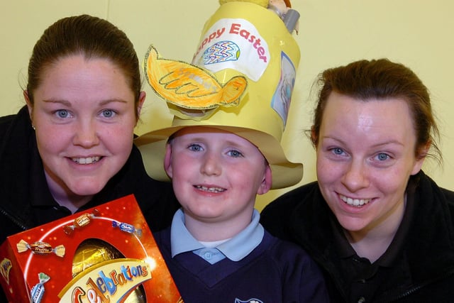 Smiles all round from St Mary's Primary School Stewartstown pupil Seamus at the school’s Easter bonnet competition. Also included are Lillian Devlin and Maria Cushenan.