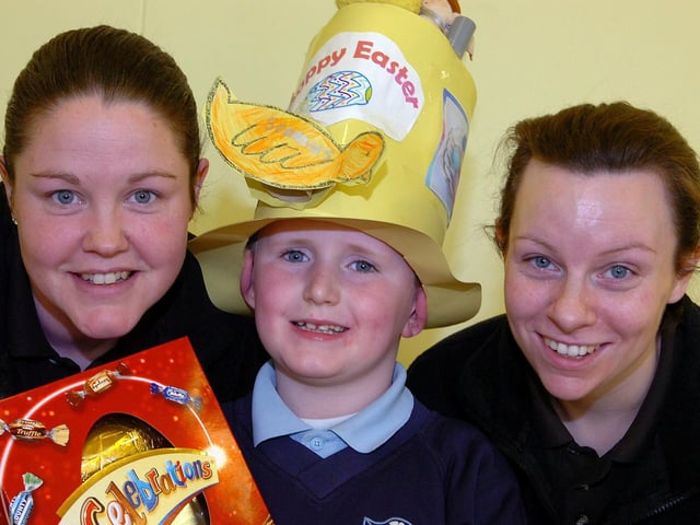 Smiles all round from St Mary's Primary School Stewartstown pupil Seamus at the school’s Easter bonnet competition. Also included are Lillian Devlin and Maria Cushenan.