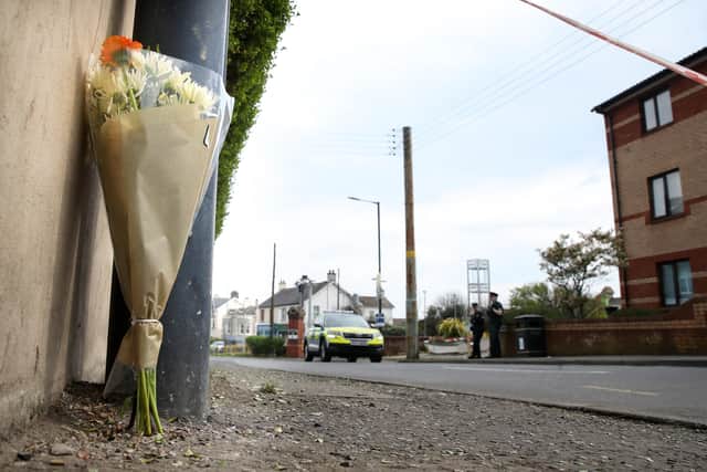 Flowers left in Whitehead following the murder of Alyson Nelson. Picture: Declan Roughan / Press Eye