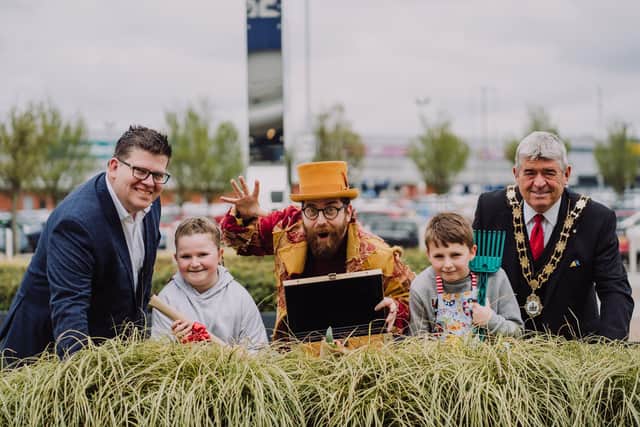 Young budding gardeners, Harry and Rosa Wallwin, join (L-R) Chris Flynn, Centre Director at The Junction, Gary Crossan, Cahoots' producer and Mayor of Antrim and Newtownabbey Cllr Billy Webb in launching the Little Green Fingers programme at Garden Show Ireland.