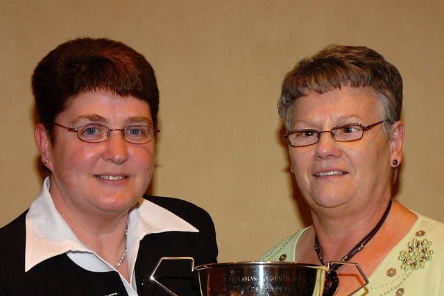 Derryloran bowls ladies singles winner Detie Young receives her prize from Janet Porteus.