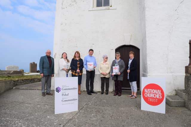 Ballintoy congregation receiving their grant