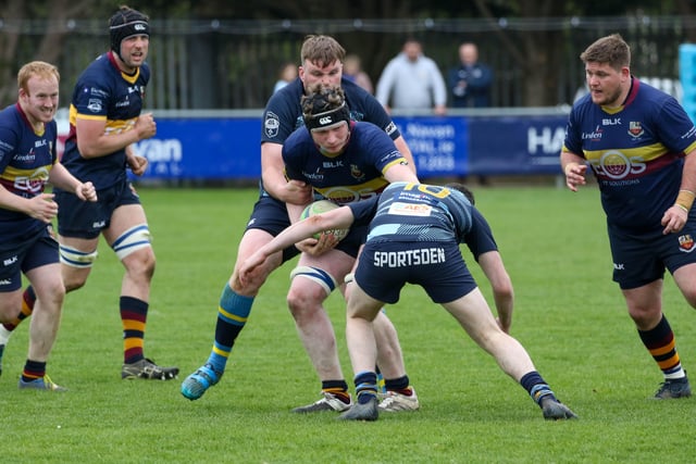 Man-of-the-match Alex Weir takes on the Navan defence