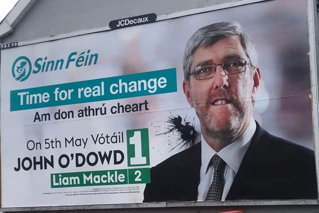 Paint was thrown at John O'Dowd's election billboard in Banbridge