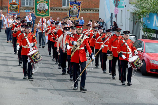 The Churchill Flute Band passes along Kennedy Place during the Twelfth of July celebrations in Londonderry.  Photo: George Sweeney. DER2128GS – 006