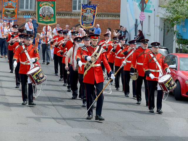 The Churchill Flute Band passes along Kennedy Place during the Twelfth of July celebrations in Londonderry.  Photo: George Sweeney. DER2128GS – 006