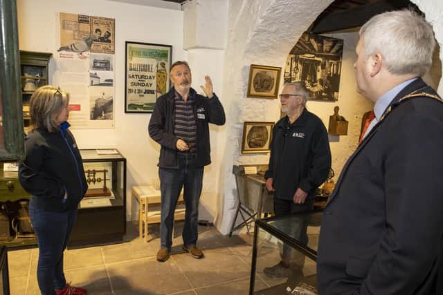 The Mayor of Causeway Coast and Glens Borough Council Councillor Richard Holmes meets with Friends of Ballycastle Museum volunteers to hear more about plans for the season ahead