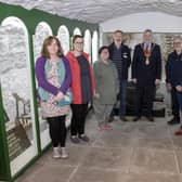 The Mayor of Causeway Coast and Glens Borough Council Councillor Richard Holmes pictured with Friends of Ballycastle Museum volunteers