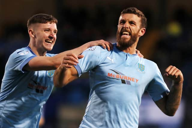 Steven McCullough celebrates his winner for Ballymena United