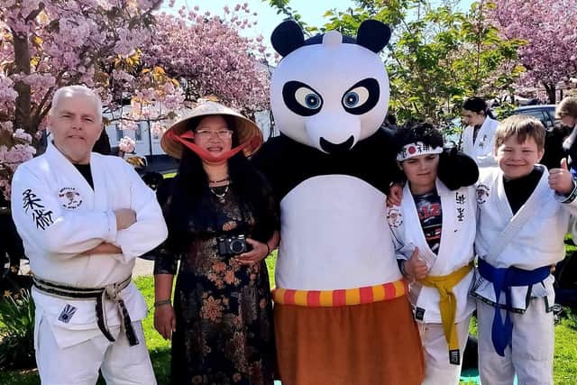 NI Vietnamese Society Chairperson and Jiu-Jitsu Club members at Merville's Cherry Blossom Festival.