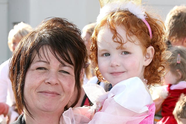 MUM'S THE WORD...Paula Hutchinson and her daughter Paige pictured during the Red Sails Festival fancy dress parade in Portstewart. CR31-218PL