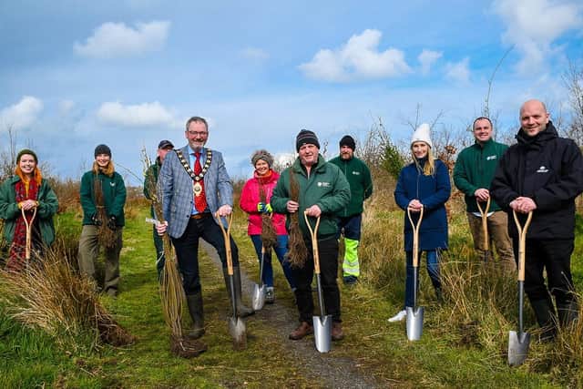 Mayor Cllr William McCaughey, Paul Armstrong from the Woodland Trust and MEA Parks & Open Spaces staff.
