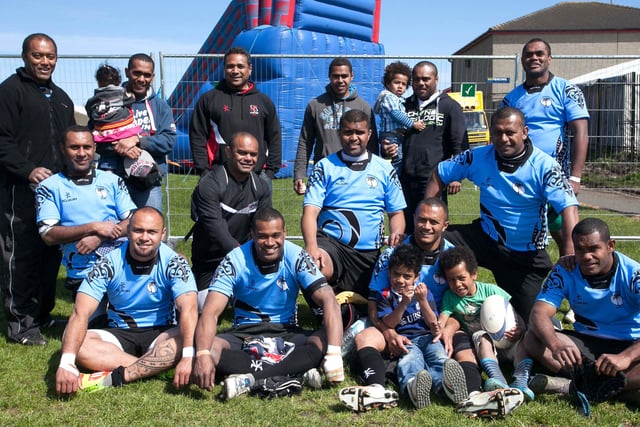 Fiji's Veivanua Rugby Sevens squad take a break from the competition in 2012.   INLT 19-426-RM