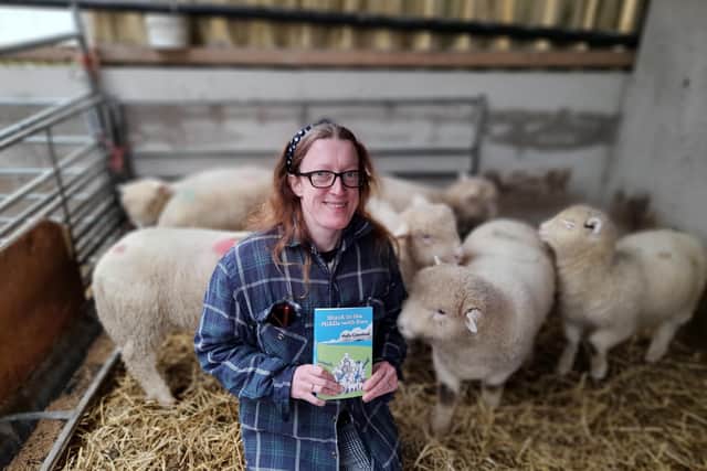 Holly with some of the pet lambs.