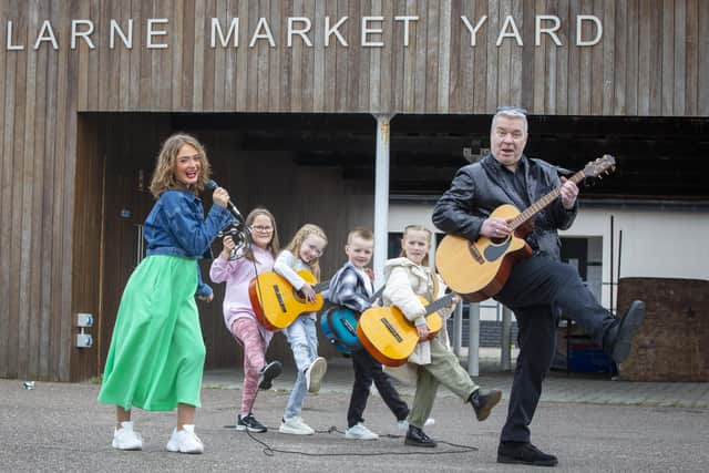 Left to right: Daisie Conway, Evie Addis, Ella Johnston, Lewis Rennie, Ruby Mills and Johnny Hero warming up for the festival.