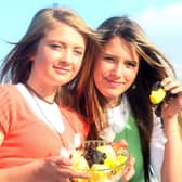 Sisters Tori and Ellie Reilly from Capecastle near Ballycastle try out some traditional yellowman and dulse as they get ready for the Oul Lammas fair on Monday and Tuesday.BM35-207JC