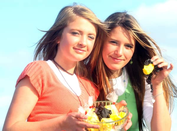 Sisters Tori and Ellie Reilly from Capecastle near Ballycastle try out some traditional yellowman and dulse as they get ready for the Oul Lammas fair on Monday and Tuesday.BM35-207JC