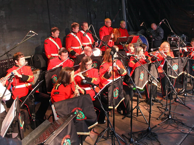 The Churchill Flute Band performing on stage in the Victoria market car park during the Fleadh Cheoil 2013. INLS 3413-520MT.