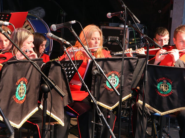 The Churchill Flute Band performing on stage in the Victoria market car park during the Fleadh Cheoil 2013. INLS 3413-523MT.