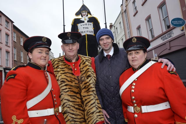 Johnny McDowell, second from right, pictured with Churchill Flute Band members Elle Jones, Gareth Jones and Donna Rowan. INLS4914-161KM