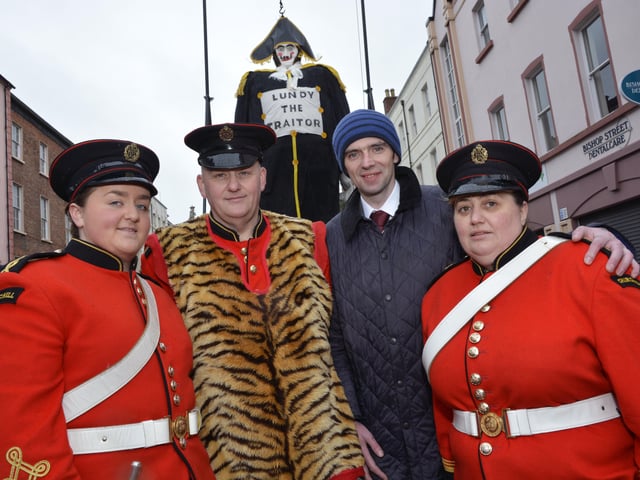 Johnny McDowell, second from right, pictured with Churchill Flute Band members Elle Jones, Gareth Jones and Donna Rowan. INLS4914-161KM