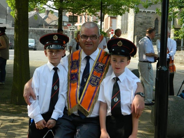 Pictured enjoying a break on Friday last at the Flagship Twelfth in Londonderry is past City of Londonderry Grand Orange Lodge Grand Master, and the organisation's current PROm Victor Wray, with his grandson, Luke McGregor, right, and Robert Crawford, triangle players with Churchill Flute Band.