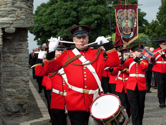 The Churchill Flute Band pictured on the city walls. INLS3313-196KM