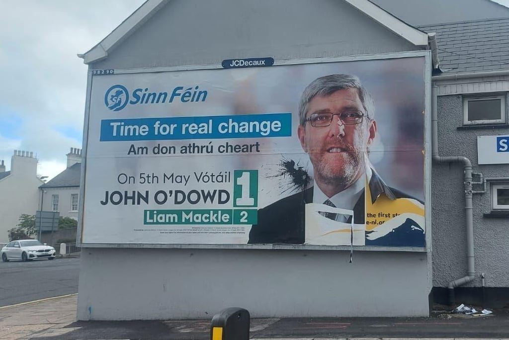 Poster vandals branded the ‘enemy of democracy’ after another Sinn Fein billboard attacked