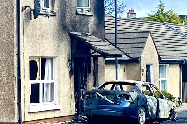 The scene of the arson at a home in Ramoan Gardens in Ballycastle where a car and a house were damaged.