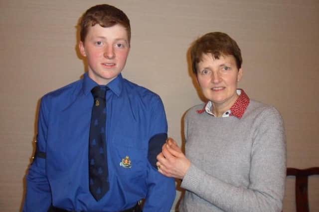 Andrew Gilmore gained the Queens Badge which was presented to him by his mother Helen